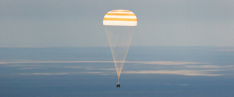 The Soyuz TMA-9 spacecraft floats to a landing southwest of Karaganda, Kazakhstan